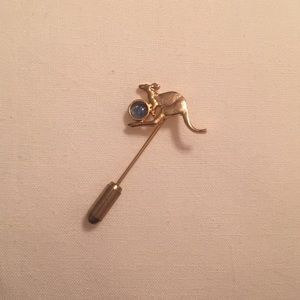 Gold tone kangaroo pin with blue opal